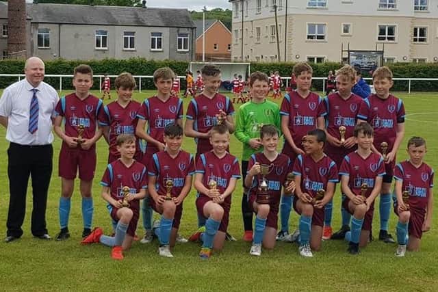 Haddington Athletic Under-13s show off the George Salmon Cup
