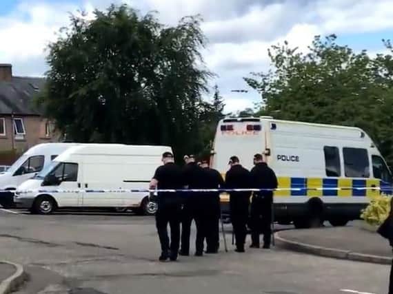Police have been examining the car park in Balerno. Video/Pic: @DainaGrassick