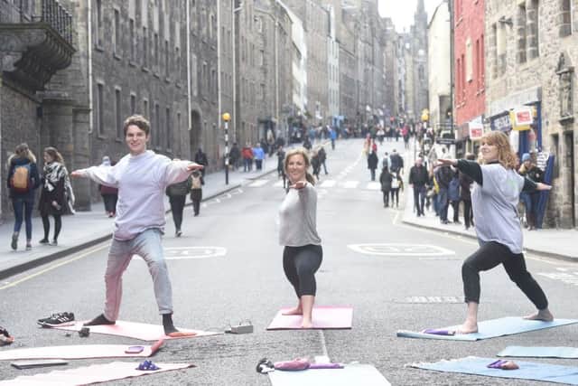 Yoga on the Canongate. Pic: Greg Macvean