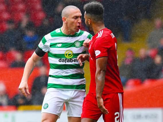 Celtic and captain Scott Brown, left, were top of the pile once again.