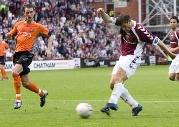 Andrius Velicka  scores the opening goal for Hearts