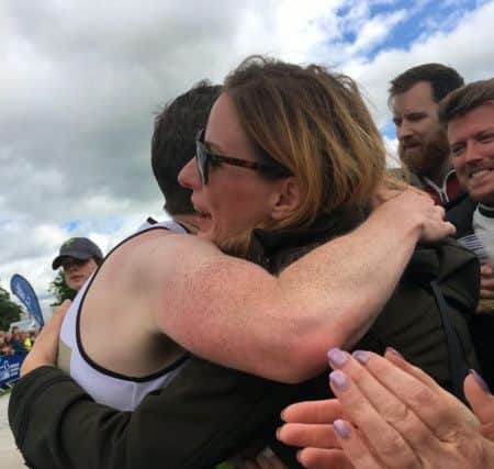 The emotional moment that marathon runner Jonny Black, 43, proposed to partner Kathryn Keir, 41, at the end of this weekends Edinburgh Marathon