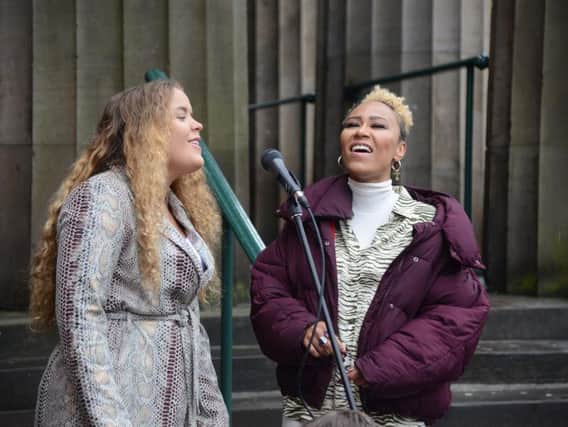Emeli Sande and Saskia Eng sing together in Edinburgh.