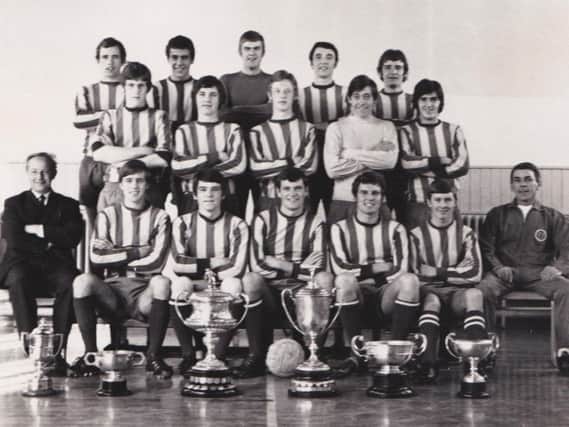 Melbourne Thistle, 1969
BACK ROW, from left: Charlie Morrison, Tom Cropley, George Young, Gus Henderson, Lenny Young.
SECOND ROW: Charlie Murphy, Ninian Cassidy, Jimmy Thomson, Alistair Matheson, Billy Blues.
FRONT ROW: Sandy Brown (manager), Erich Schaedler, Dennis Nelson, Allan Munro (captain), David Ross, Alan Buchanan and Johnny Mochan (coach).