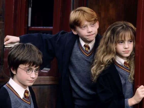 Watch the trio navigate their first year at Hogwarts to the sound of a live orchestra (Photo: Warner Brothers)