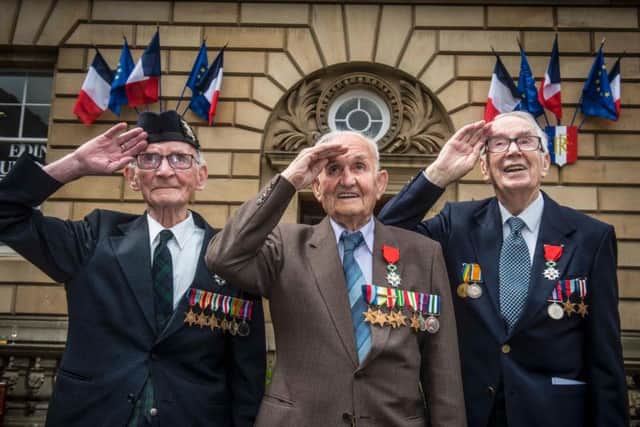 D-Day veterans Jack Adamson, David Livingston and Robert Jobson Paton outside the French Consulate