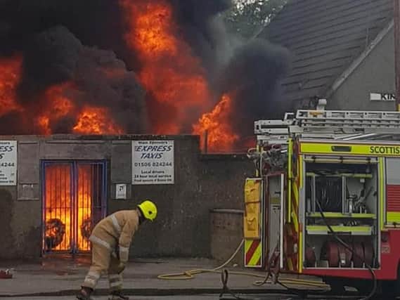 Firefighters battle the flames on Tuesday. Pic: Philip Mearns