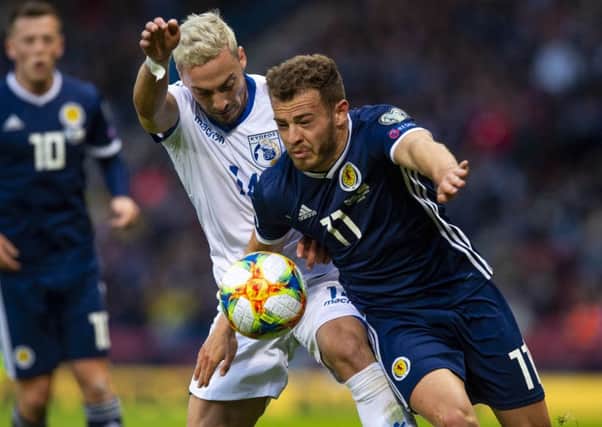 Ryan Fraser gets ahead of Antreas Makris of Cyrpus in their Group I clash at Hampden Park on Saturday. Pic: SNS