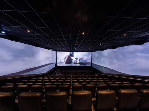 Moviegoers can go beyond the frame of the movie screen by being at the centre of an expanding image for an expansive viewing experience.