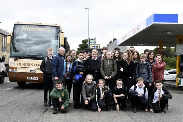 Lesley Crow with other parents and children who use the bus from this area to get to and from schoo. Pic: Lisa Ferguson