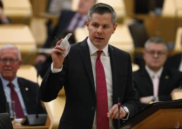 Derek Mackay is more interested in being seen to tax the better-off than bringing in more money. Picture: Andrew Cowan