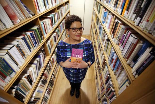 New Makar Jackie Kay (National Poet for Scotland) with her book Fiere at the Scottish Poetry Library in Edinburgh. Pic: Andrew Milligan/PA Wire