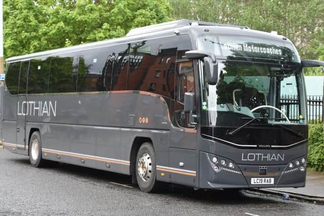 Another coach had the number LC19 RAB - seen as a dig at Rabbie's Trailburners