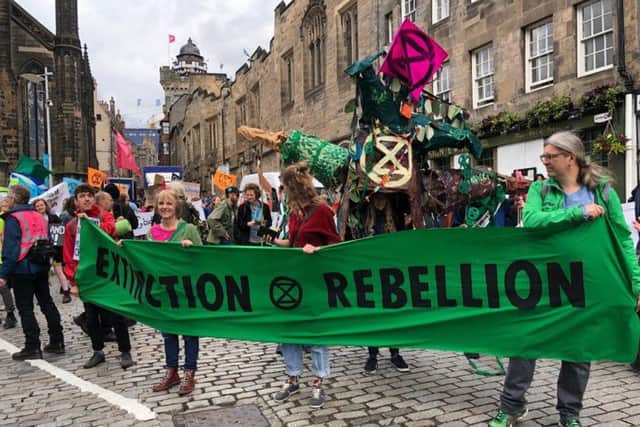 Protesters during the march between Edinburgh Castle and Holyrood. Pic: Lisa Ferguson