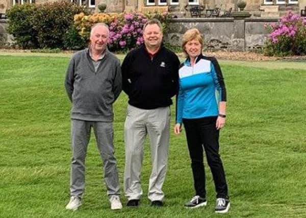 Club captains Armar Johnston and Caroline Mansley flank Andrew Oldcorn at Ratho Park Golf Club to where he has returned after 42 years