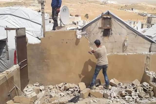 Syrian refugees in the Arsal camp have been ordered to tear down their building over what the Lebanese authorities have called "security risks"