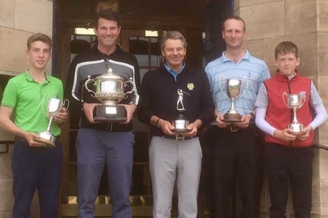Some of the Gullane club champions show off their trophies