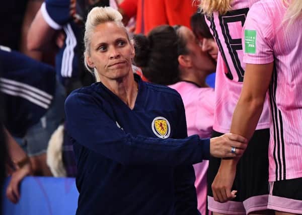 Shelley Kerr consoles her players at the end of the match. Picture: AFP/Getty Images