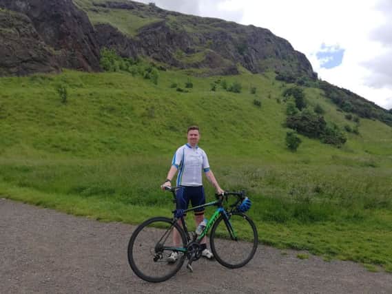 Kieran Power, 33, is raising funds for  mental health chairty MIND by cycling around Arthur's Seat for 24 hours