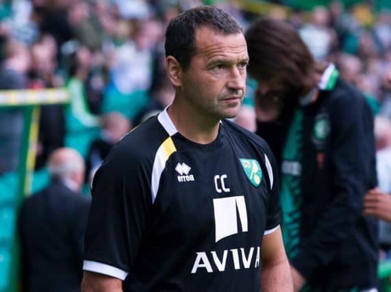 Former Hibs manager Colin Calderwood will face Hearts with Cambridge United next month