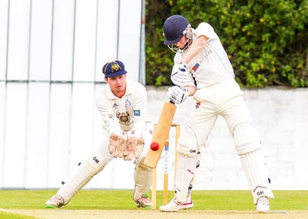 Grange batsman Scott Blain is forced to fend off a spinning bowl from RH Corstorphines Majid Haq
