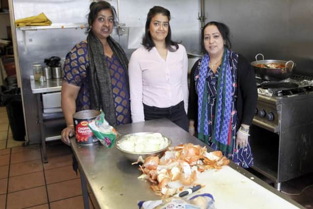 Darshan Caur, cafe manager Sinita Potiwal and Asha Singh PIC: Alistair Linford