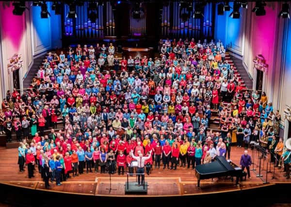 The massed ranks of the Love Music Community Choir and Junior Choir at the Usher Hall