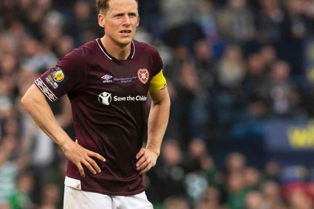 Christophe Berra's no-nonsense approach saw him regarded as the best left-sided Hearts centre-back of the 21st century. Picture: SNS