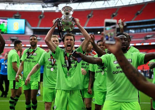 Christian Doidge celebrates Forest Green's National League play-off final win overTranmere at Wembley Stadium in 2017  Pic: Ben Hoskins/Getty Images