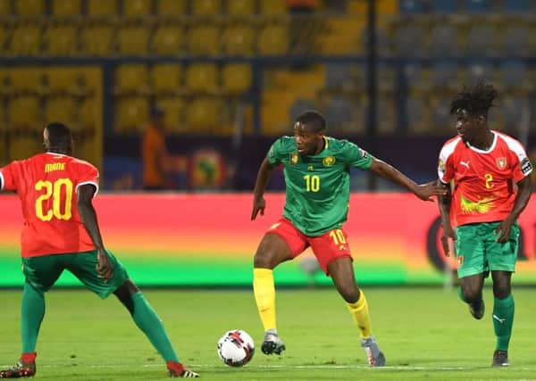 Hearts midfielder Arnaud Djoum in action for Cameroon against Guinea-Bissau. Picture: AFP/Getty Images