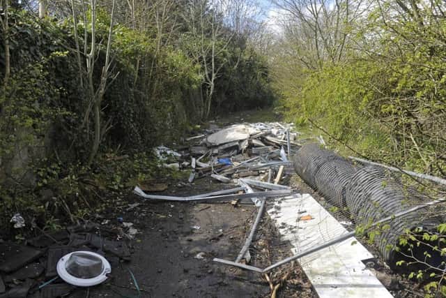 Residents and workmen can be fined for fly-tipping