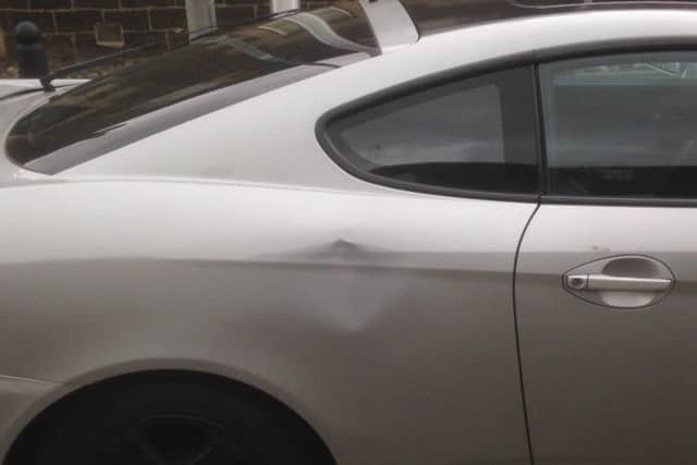Mr Murphy's car was dented