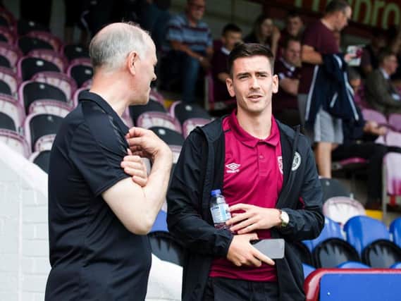 Jamie Walker looked on as Hearts played their first pre-season friendly against Arbroath at Gayfield Park on Saturday