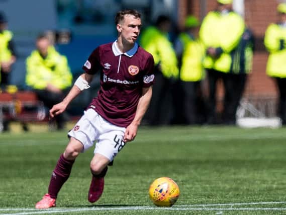 Chris Hamilton has signed a new three-year deal with Hearts.