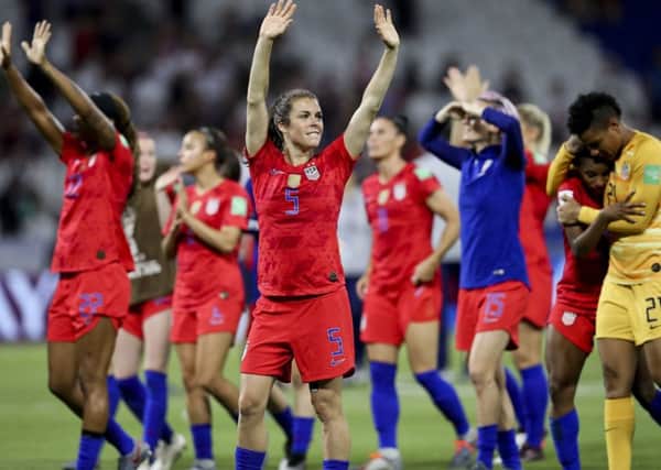 United States' players celebrate their victory against England after the Women's World Cup semifinal soccer match at the Stade de Lyon outside Lyon, France, Tuesday, July 2, 2019. (AP Photo/Francisco Seco)