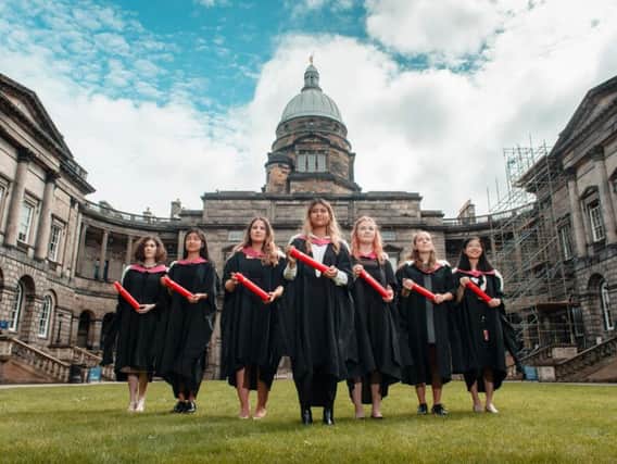 Pictured at Old College, seven current students at Edinburgh Medical School will collect the degrees on behalf of the women. Left to right, Violet Borkowska, Hikari Sakurai, Megan Cameron, Simran Piya, Caitlin Taylor, Izzie Dighero and Mei Yen Liew. (Photograph: MAVERICK PHOTO AGENCY)