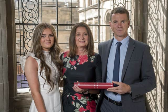Keith, his wife Margaret, and daughter Emma, attended Edinburgh Universitys geography graduation to collect Bens posthumous degree. Picture: Contributed