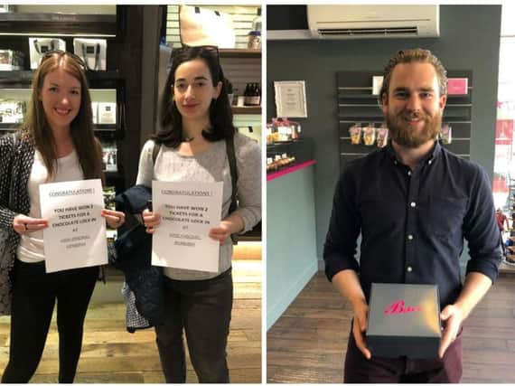 Two women picking up their Hotel Chocolat prizes and one man with his Bibi's Bakery cupcakes. Pictures: contributed.