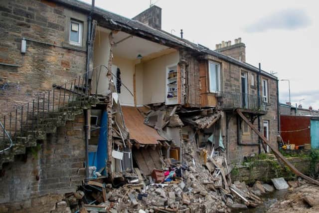 The torrential downfall left a devastating trail of destruction in its wake with a number of properties