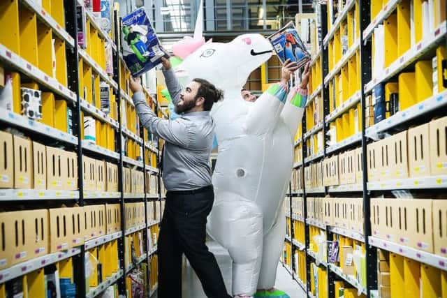 The Amazon fulfilment centre in Dunfermline stores, picks, packs and ships the firms products. Picture: Andy Buchanan