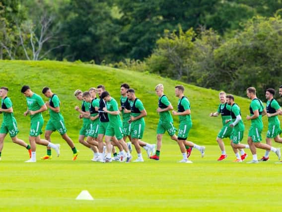 The Hibs squad are put through their paces at East Mains