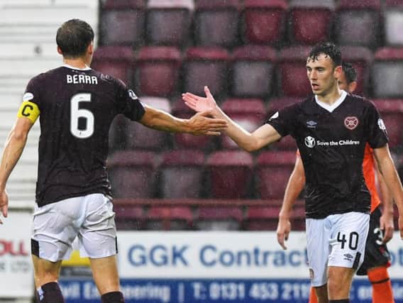 Hearts teenager Andy Irving, right, had a mixed evening.