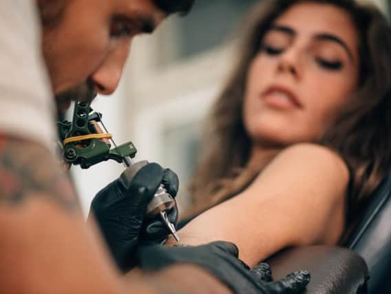 Do you trust someone enough to design a tattoo for you? (Photo: Shutterstock)