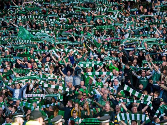 Hibs fans celebrate after defeating Rangers in the 2016 Scottish Cup final.