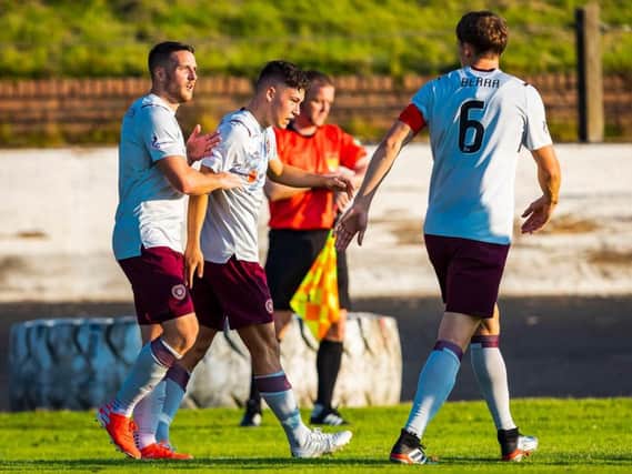 Anthony McDonald (centre) celebrates after putting Hearts 2-0 up.