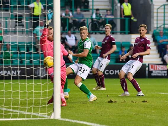 Fraser Murray came off the bench to score Hibs' third. Pic: SNS