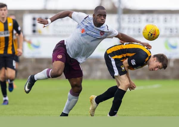 Uche Ikpeazu is one of the Hearts strikers vying for goals. Pic: SNS