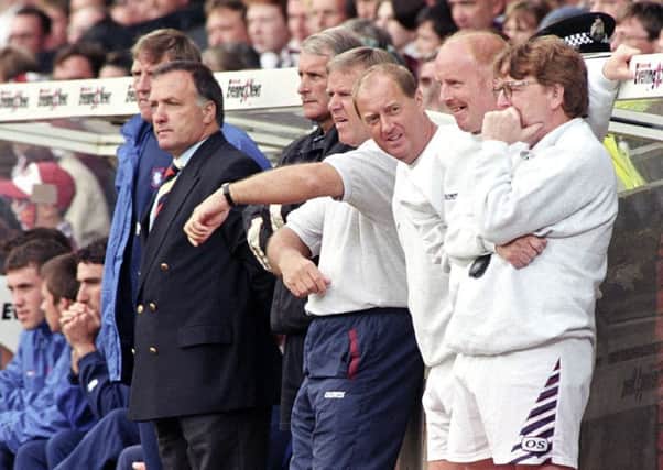 Dick Advocaat and Jim Jefferies watch on