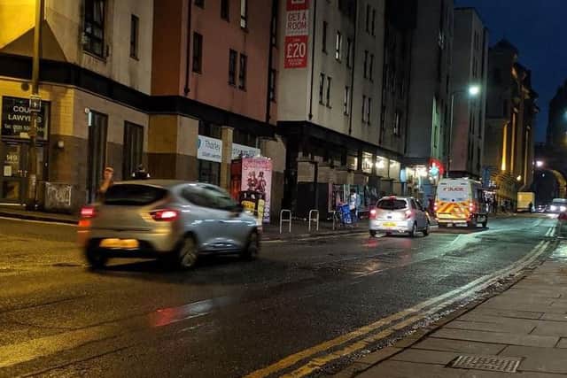 Photos have emerged of cars using the Cowgate despite controls in place  some show police vehicles using the busy thoroughfare.