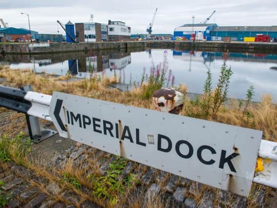 Emergency services raced to Leith Docks late last night. Picture: JPIMedia
